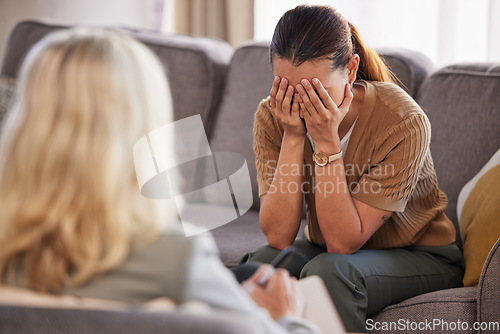 Image of Psychology, mental health and depression with women, doctor with patient and stress, sad and frustrated in therapy session. Psychologist, depressed and cry with therapist counseling through trauma.