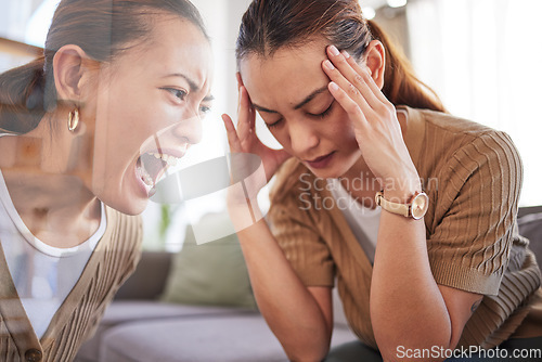 Image of Woman, anxiety and depression on sofa with headache, reflection and shout with pain in home. Depressed girl, mental health and frustrated while angry, sad and sitting on couch at house in Los Angeles