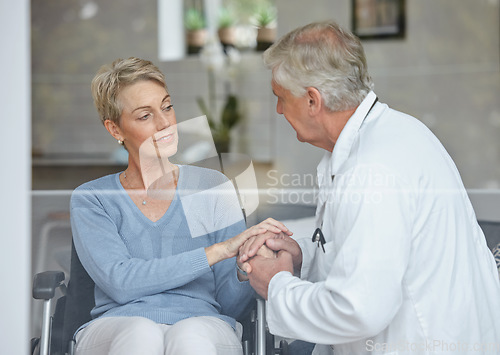 Image of Doctor, woman patient, and senior holding hands for healthcare consulting support for sad news. Hospital, wellness and health clinic with a elderly worker showing empathy after consultation test