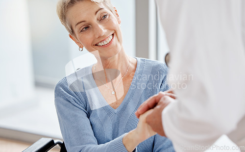 Image of Senior woman, doctor or holding hands in wheelchair support, surgery trust or healthcare wellness security. Smile, happy or disability retirement elderly and medical worker in hospital life insurance