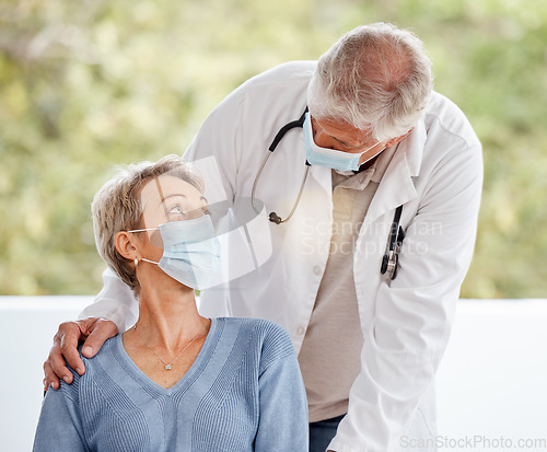 Image of Covid mask, elderly doctor and woman patient in a medical consultation in a hospital office. Healthcare, nurse and senior wellness consulting employee with support and care for health and insurance