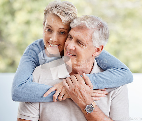 Image of Elderly, couple and love, hug and relax at family home, commitment with trust, partnership and marriage with happiness. Mature, man and woman with support and hands touch, solidarity and relationship