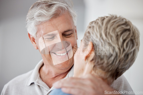 Image of Senior couple, retirement and man hug woman at home for love, care and support together. Face of elderly partner, happy marriage and old couple relax in family home, apartment and pensioner lifestyle