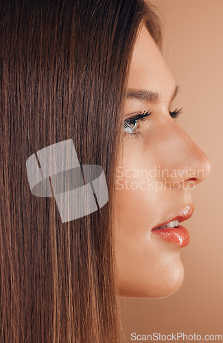 Image of Hair, beauty and face profile of woman in studio on brown background for beauty products, makeup and cosmetics. Spa, salon aesthetic and side profile of girl for treatment, healthy skin and hair care