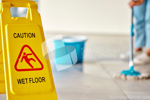 Image of Spring cleaning, wet or floor with mopping sign on home or office building in hygiene maintenance, healthcare or bacteria wellness. Zoom, information or housekeeping warning board for slipping safety