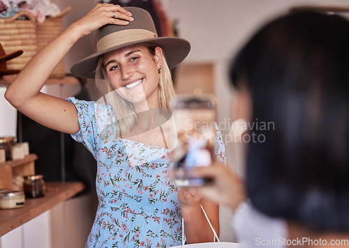 Image of Fashion, friends shopping and taking pictures with phone for happy memory, profile picture or social media. Retail mall, sales deals and women or girls trying hats and taking mobile smartphone photo.