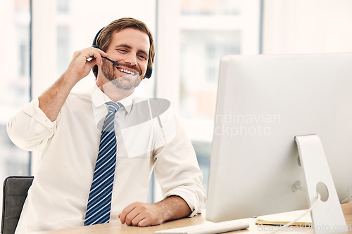 Image of Call center man and telemarketing for customer support or consulting in office. Male, consultant and agent with headset, communication or computer for client service, talking or speaking in workplace