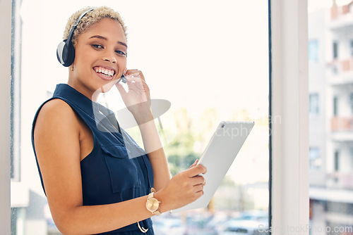 Image of Leadership, tablet or black woman in a telemarketing call center for consulting, communication or helping clients. Digital, crm or happy manager talking, conversation or speaking at customer services