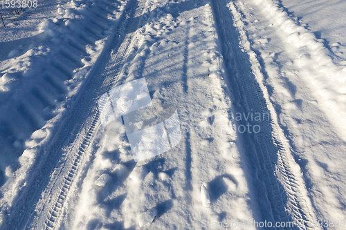 Image of narrow winter road , closeup