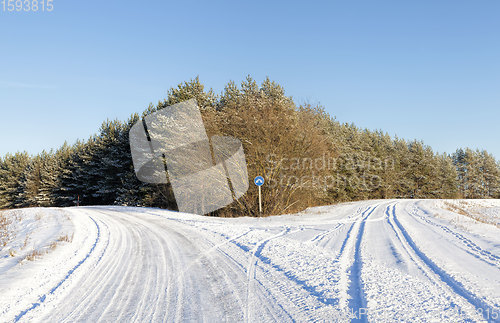 Image of winter time on a narrow rural highway