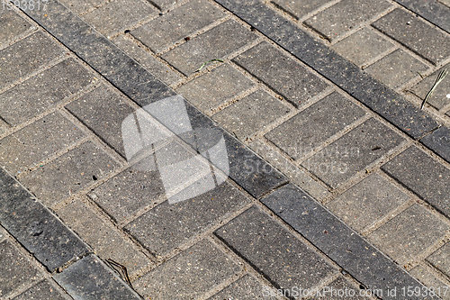 Image of part of the road made of concrete tile