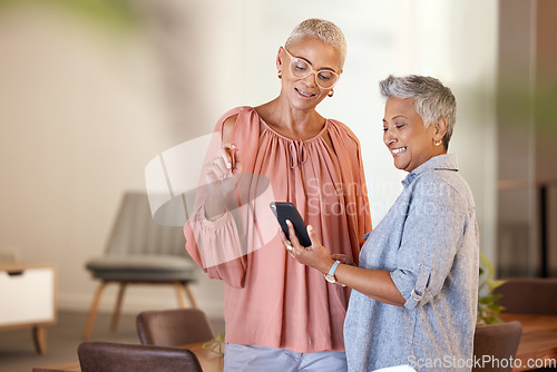 Image of Senior women, phone and friends in home on social media, internet browsing or texting. Tech, cellphone and retired, elderly and happy females web scrolling with mobile smartphone together in house.