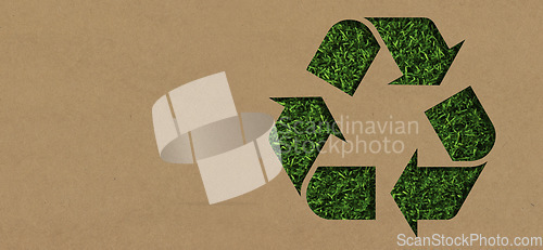 Image of Grass, mockup and cardboard with recycle arrow for sustainability, environment and package pollution. Recycling, earth day and energy with eco friendly sign for reusable, clean energy and nature