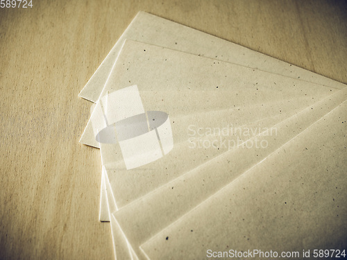 Image of Vintage looking Letter envelope on wood table