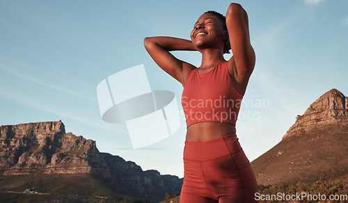 Image of Freedom, running and mountains with black woman in nature for workout, sports and endurance training. Stamina, cardio and fitness with runner at sunset for adventure, jogging and trekking achievement