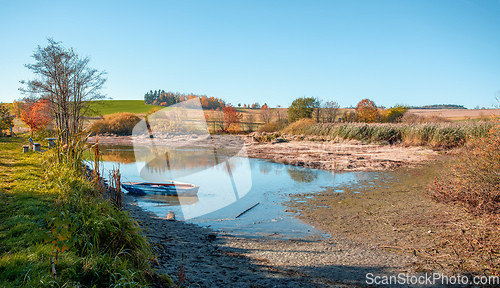 Image of The cool autumn morning at the pond