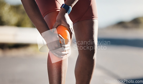 Image of Knee injury, running pain and woman in street for fitness training, emergency and body accident in Germany. Anatomy, exercise and painful muscle of a runner, hurt leg and medical problem in the road