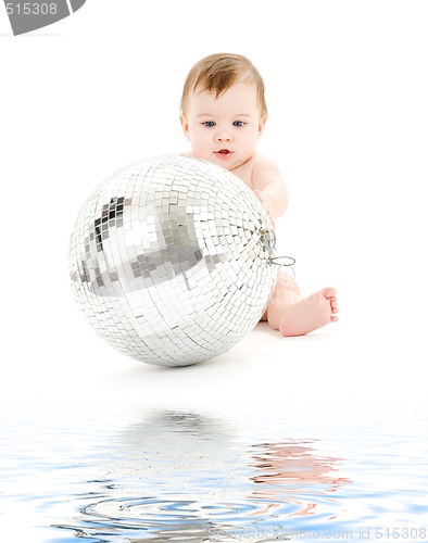 Image of adorable baby boy with big disco ball