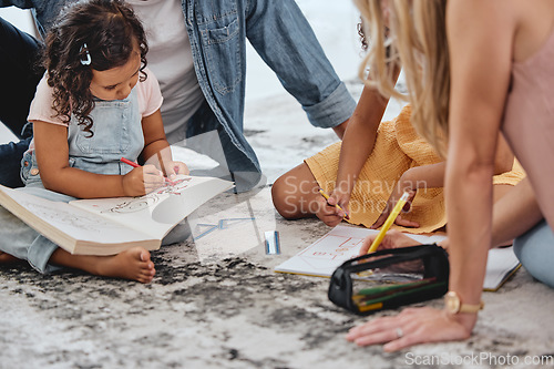 Image of Kids, floor and coloring book with parents for learning, education and fun on family home carpet. Girl children, mom and dad on flooring for teaching, art or development with bonding in San Francisco