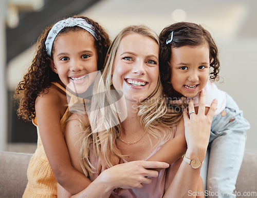 Image of Adoption, family and portrait of mother with kids in home, bonding and hugging. Love, care and mom with foster girls, embrace and smiling while enjoying quality time together on sofa in living room.