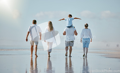 Image of Family, beach and travel with love and generations, together on vacation in Australia, sea and back view. Holiday, summer and sun, parents, grandparents and child, quality time outdoor and adventure.