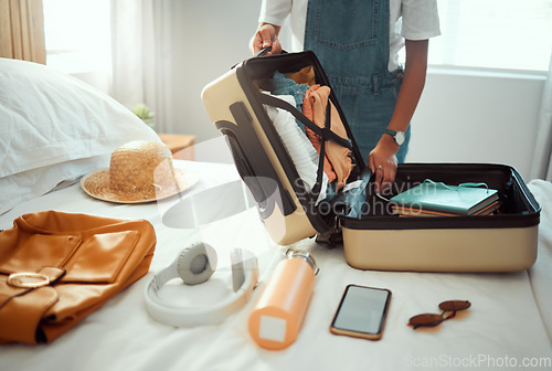 Image of Suitcase, woman and packing clothes, bag and luggage for travel, vacation and international journey, summer adventure and tourism. Closeup female tourist, hotel room and holiday clothing in baggage