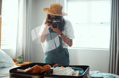 Image of Photography, travel luggage and woman with camera shooting suitcase clothes for summer vacation. Home bedroom, memory picture and photographer girl going on global holiday, adventure journey or trip