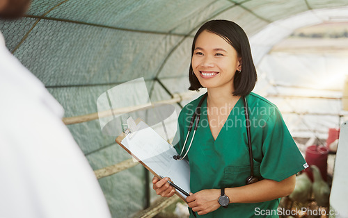 Image of Vet, animal health and woman with checklist for bird flu symptoms and agriculture on chicken farm. Poultry farming, veterinary and doctor with clipboard for medical check, medicine and sustainability