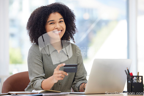 Image of Credit card, laptop and black woman portrait in office for online shopping, fintech payment and finance employeer happy to invest savings. African woman, ecommerce web or internet banking on computer