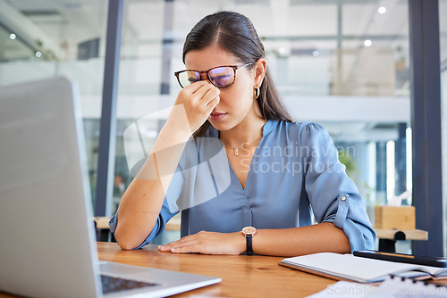 Image of Stress headache, burnout and woman in office overwhelmed with workload at desk with laptop. Frustrated, overworked and tired woman with computer at startup, anxiety from deadline time pressure crisis