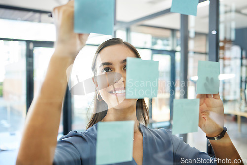 Image of Agenda, writing or woman with sticky notes for goals, our vision or mission for a startup company in an office building. Smile, creative or happy employee planning ideas or a productivity schedule