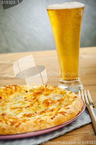 Image of Pizza and beer