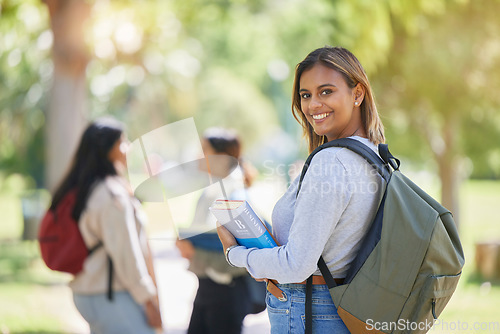 Image of Education, university and woman student with learning, scholarship and college campus, book for reading and study in academic portrait. Young girl smile, backpack and learn with knowledge in Boston.