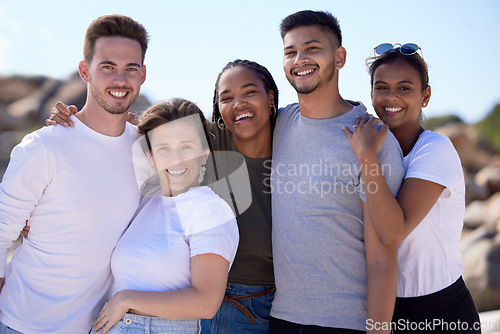 Image of Hug, happy and portrait of friends at the beach, ocean travel and smile on holiday in Miami. Nature, summer diversity and men and women at the sea for vacation, affection and happiness as a group