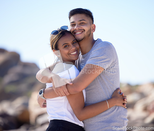 Image of Love, beach and portrait of couple hug enjoying summer vacation, holiday travel and weekend together. Dating, romance and young man and woman hugging, smile and bonding for quality time in nature