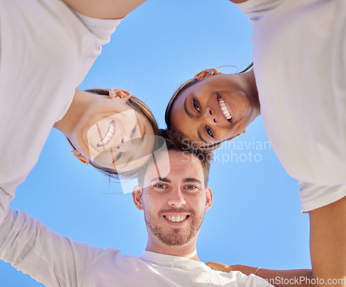 Image of Diversity, friends and head circle together outdoor for happiness, support huddle and unity collaboration. Interracial friendship group, trust and smile for teamwork solidarity in California blue sky