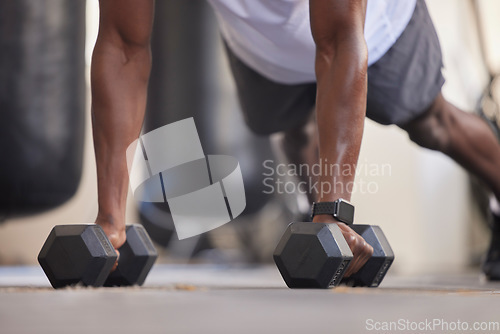 Image of Weights, training and arms of a man in the gym, strong fitness and muscle building on the floor. Health, body and athlete strength training with a plank during a workout and exercise for health