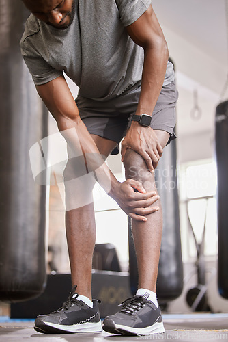 Image of Fitness, knee pain and injury of man in gym with muscle accident, medical emergency and first aid risk after exercise training. Joint pain, legs and bone health from sports workout, wound and problem