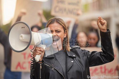 Image of Justice, megaphone and shouting with woman in protest for equality, freedom and support for change. Global fight, social and future with girl in crowd for human rights, community and revolution
