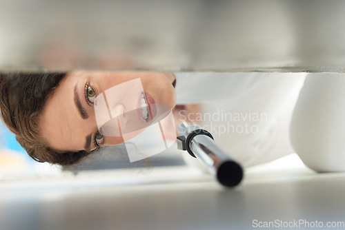 Image of Cleaning, vacuum and face of woman under sofa for housework or hygiene. Spring cleaning, machine and portrait of female cleaner vacuuming floor to remove dust or dirt in home living room or lounge.