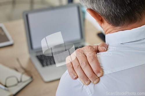 Image of Shoulder pain, businessman at laptop in office with stress, anxiety and heart attack risk. Ceo, fatigue and cardiovascular problem of person working at corporate desk with burnout back view.