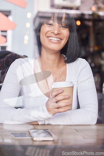 Image of City, cafe window and portrait of woman with coffee and smile looking at street while drinking coffee. Relax, reflection in glass and happy woman customer in coffee shop with phone and credit card.