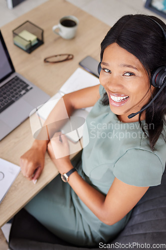 Image of Black woman, office and call center in portrait for business communication, ecommerce management and telemarketing. African consultant, virtual assistant or advisor face working on a career strategy