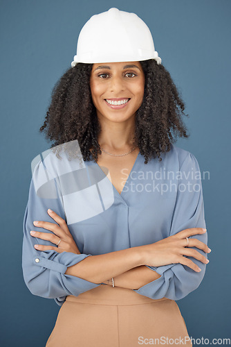 Image of Black woman, portrait and hard hat for architecture, engineering and construction safety on studio background in Brazil. Happy female contractor, project management and industrial property designer