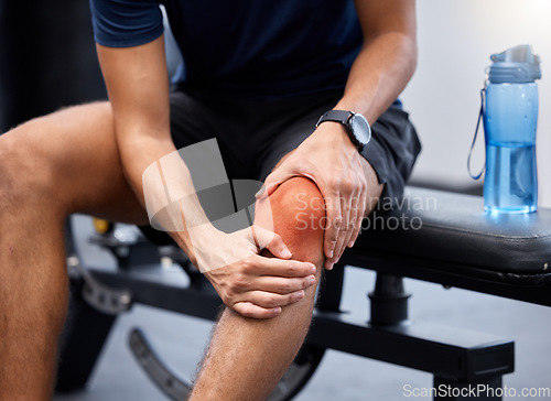 Image of Knee pain, sport accident or man in gym for training, fitness or exercise for injury. Male, athlete or muscle tension for workout, sore joint or health problem with practice or fibromyalgia emergency