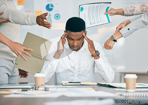 Image of Stress, burnout and tired black man with headache, frustrated or overwhelmed by coworkers at workplace. Overworked, mental health and anxiety of exhausted male worker multitasking at desk in office.