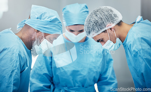 Image of Medical, teamwork and surgery with doctors in hospital for emergency, safety and operation. Helping, healthcare and collaboration with surgeon in operating room for cardiology, medicine and focus