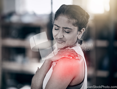 Image of Woman, fitness and shoulder pain in gym for exercise workout, training accident and sports medical emergency. Sad athlete, arm injury and physical therapy, arthritis or muscle wellness in health club