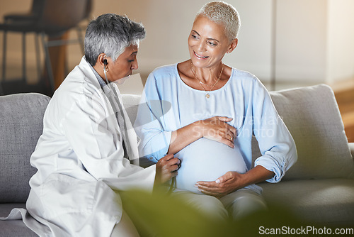 Image of Healthcare, ivf consulting and pregnant woman with doctor on sofa for examination, checkup and baby health during home visit. Senior woman, pregnancy and medical professional doing exam on patient