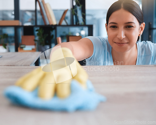 Image of Happy, fabric and woman cleaning table furniture for hygiene, sanitary and housekeeping service. Germs, bacteria and dust with girl cleaner wipe wooden surface for disinfection, safety and domestic